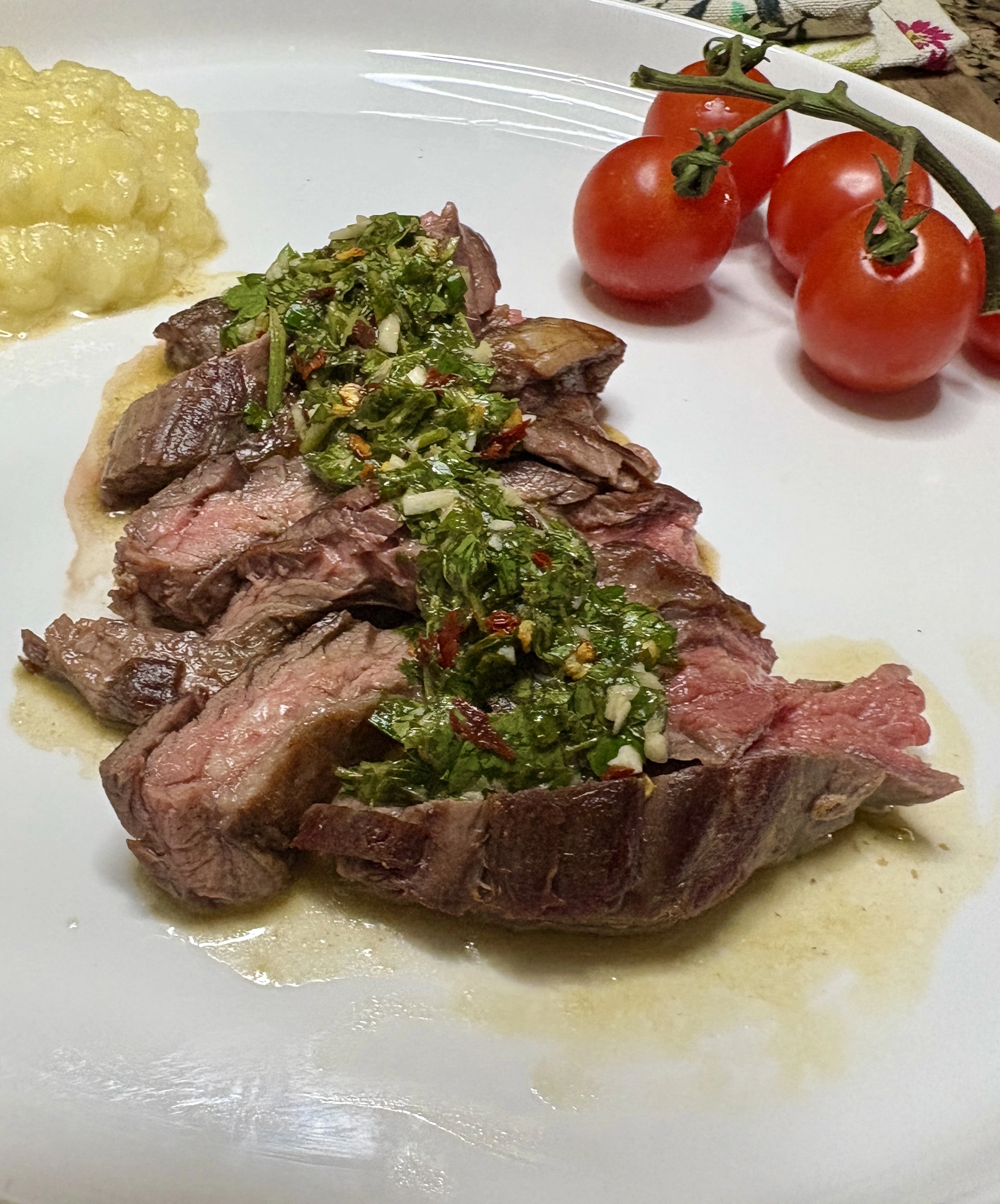 Grilled skirt steak with chimichurri sauce